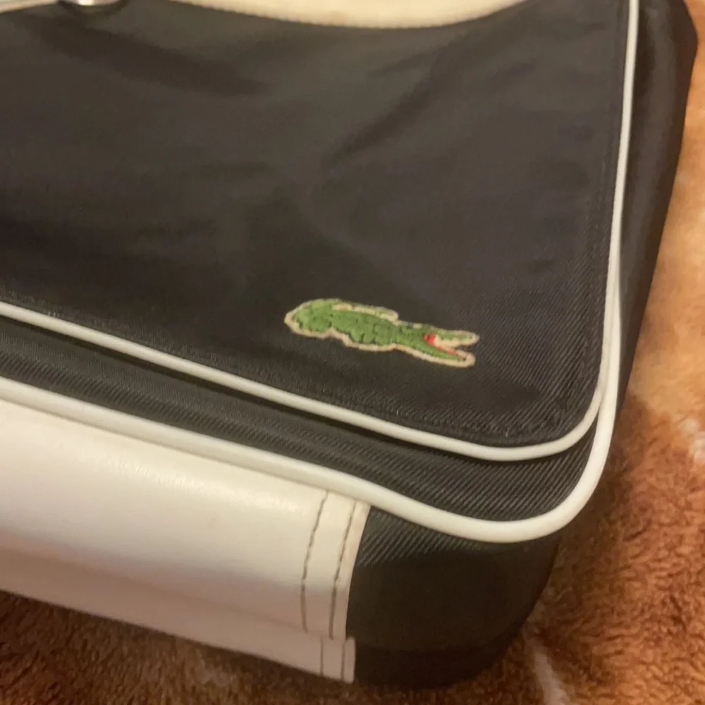 Lacoste Black Messenger Bag with White Trim and Green Logo